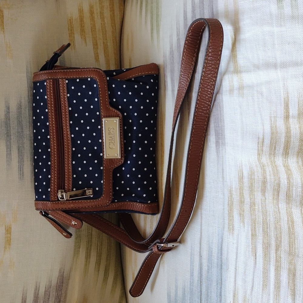 Chaps crossbody navy polkadot purse with pink liner.